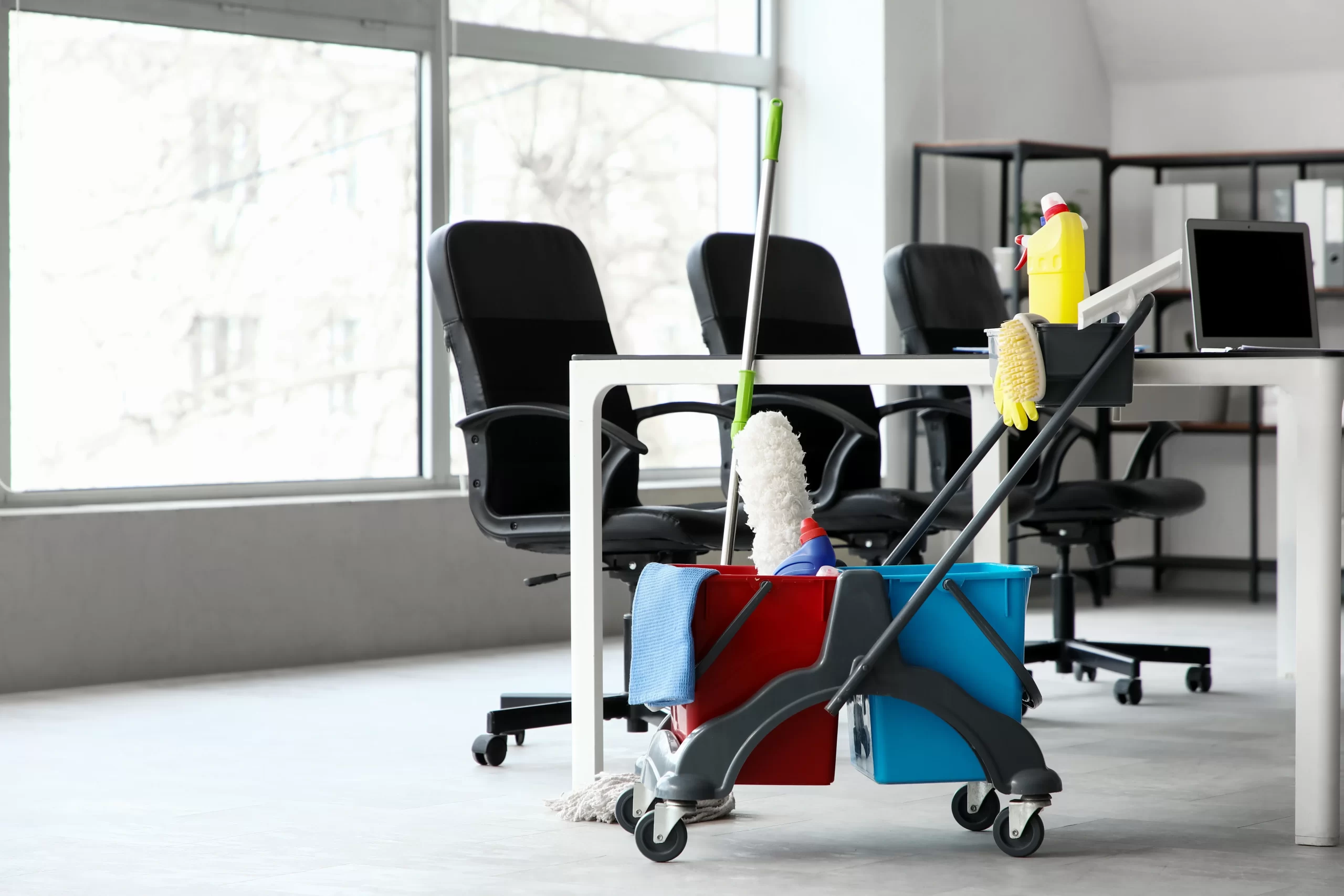 Janitor's trolley with cleaning supplies in modern office maids my way belleville illinois
