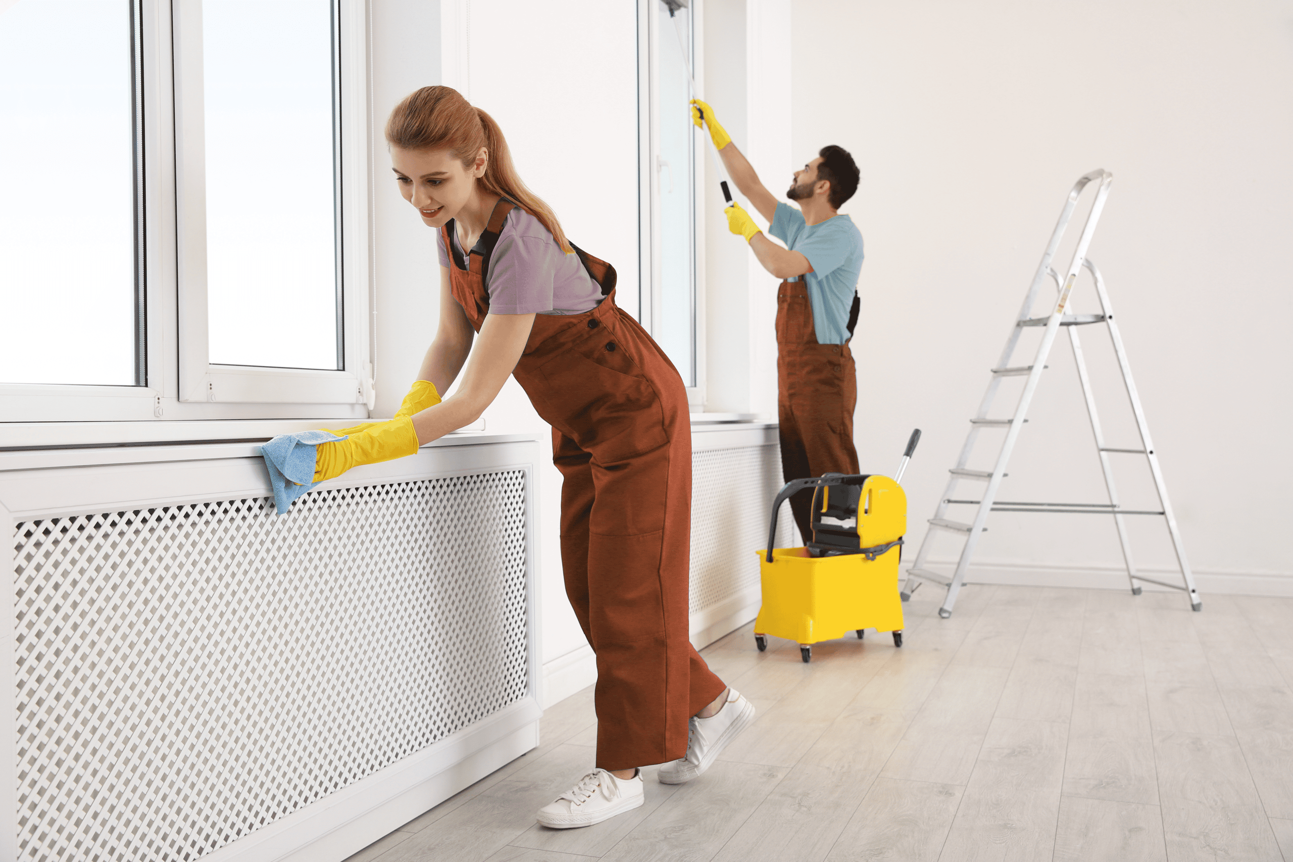 Professional janitors in uniform cleaning spacious room maids my way belleville illinois